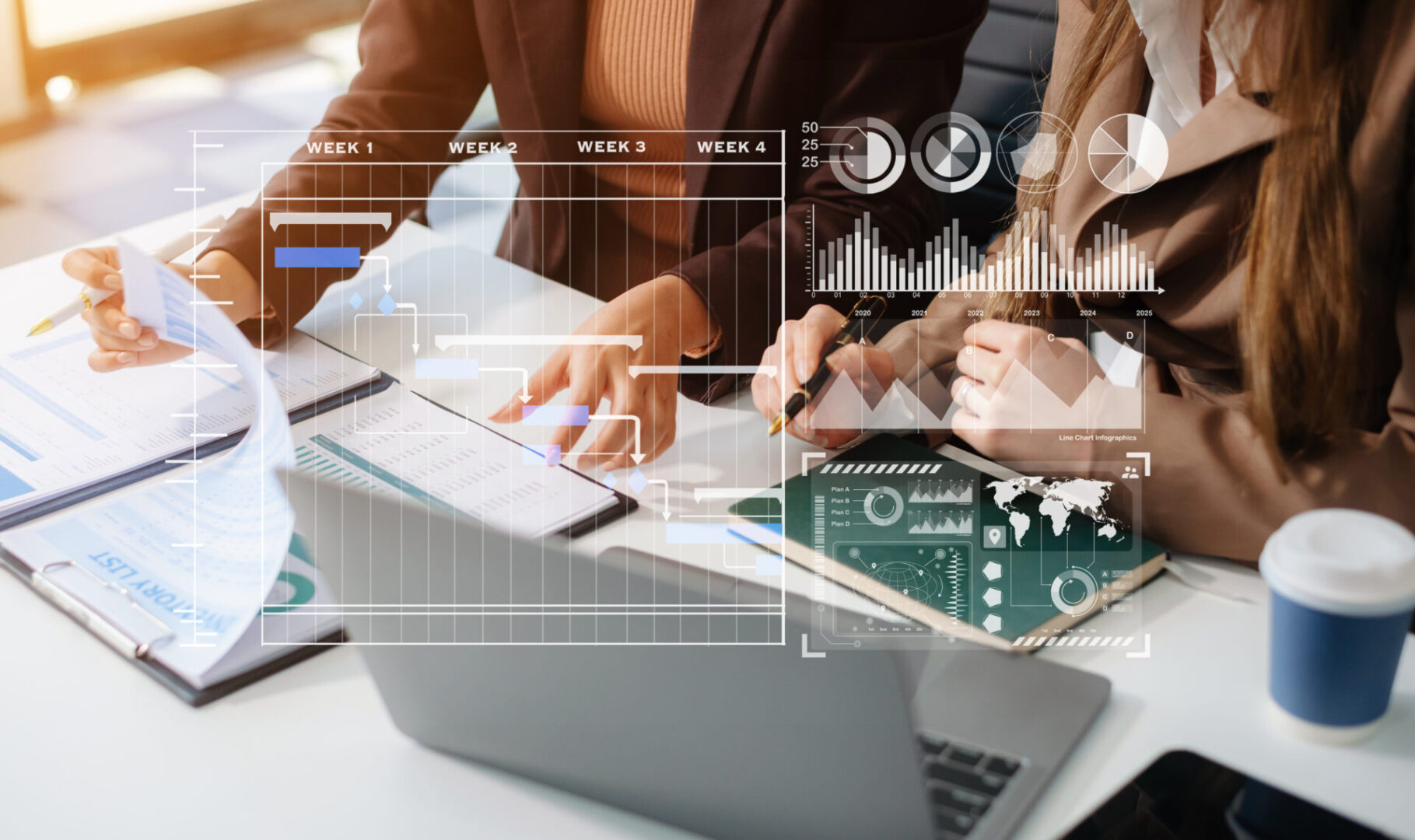 Business meeting with digital analytics display